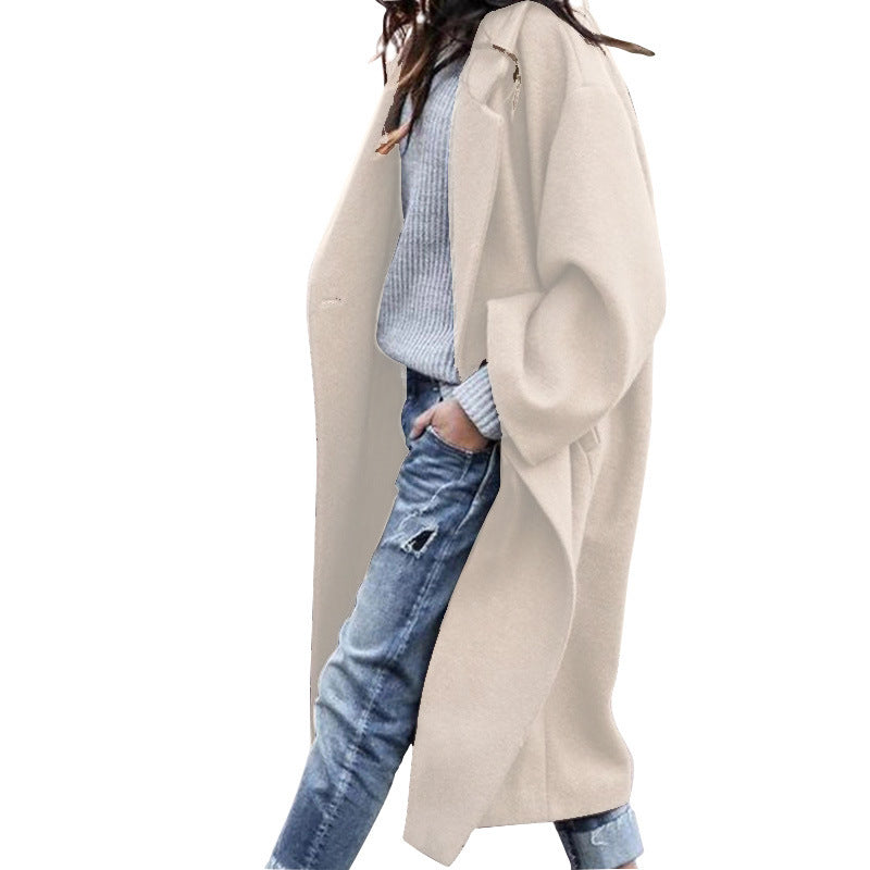 Single-breasted long coat with a lapel collar and pockets
