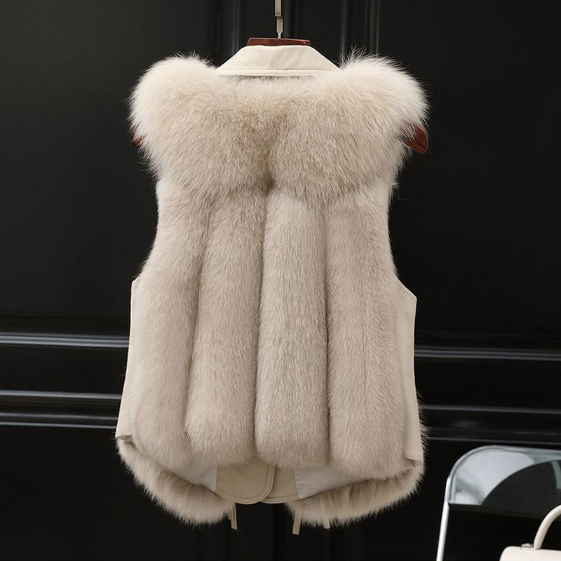 Woman in a short faux fur vest