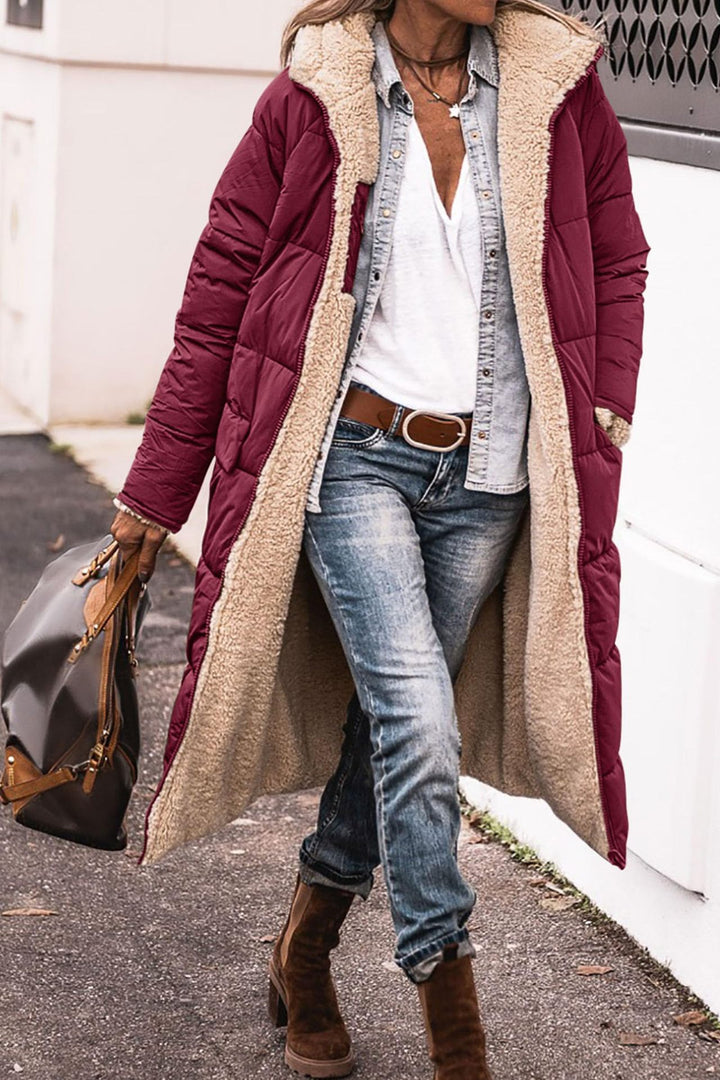 Reversible hooded long coat with pockets and raglan sleeves