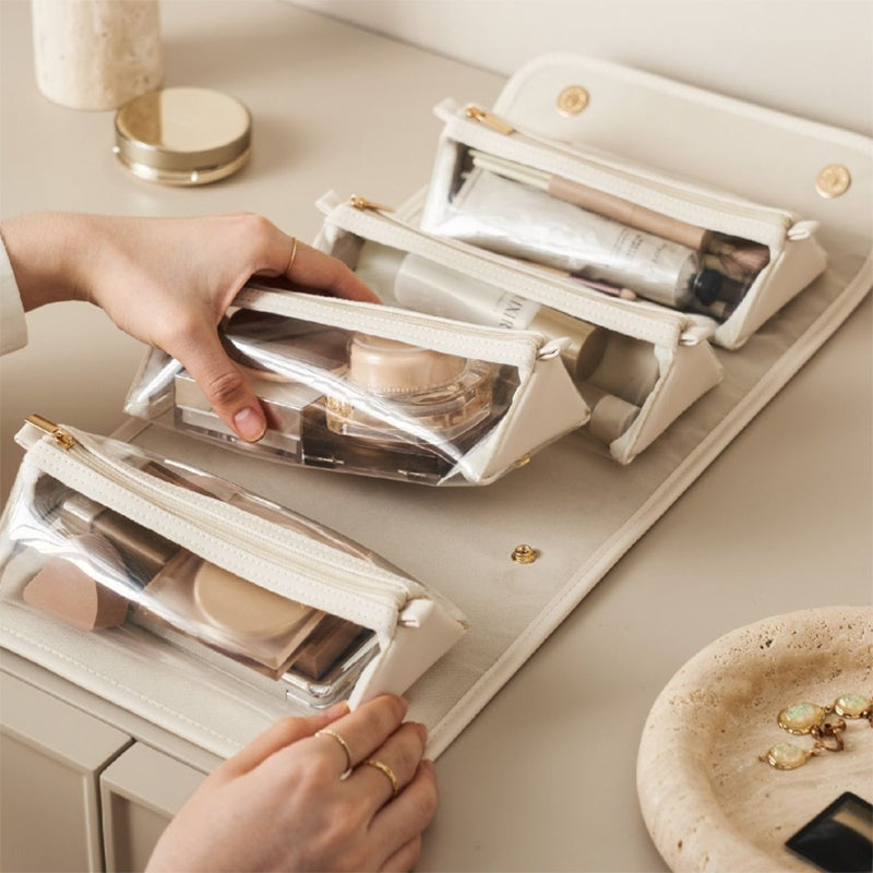 Cream toiletry bag with clear pouches