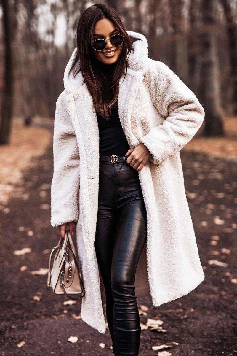 Woman in long hooded teddy coat