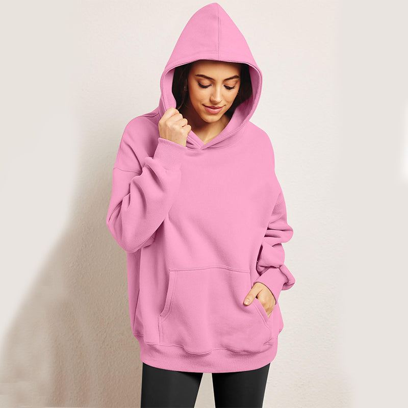 Woman wearing oversized fleece hoodie
