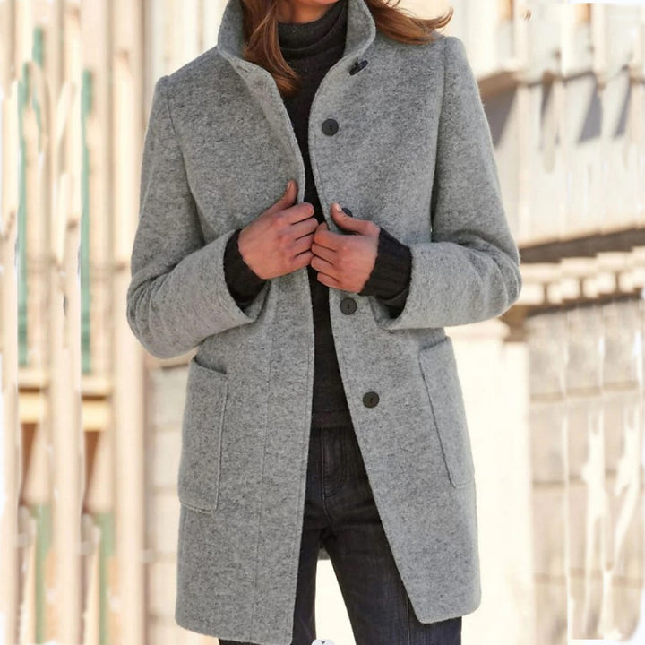 Woman in stand collar button coat
