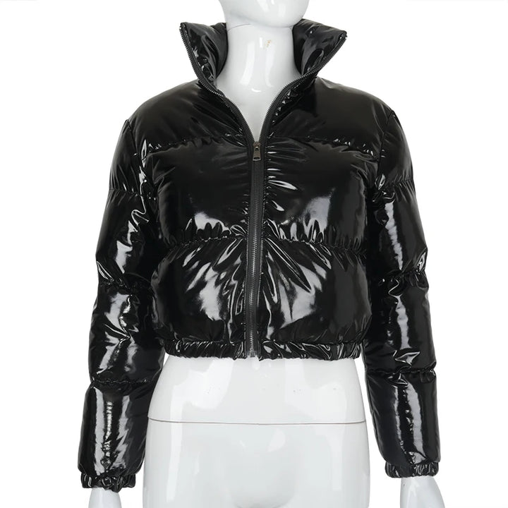 Woman in a glossy cropped puffer jacket
