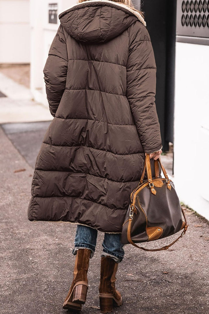 Reversible hooded long coat with pockets and raglan sleeves