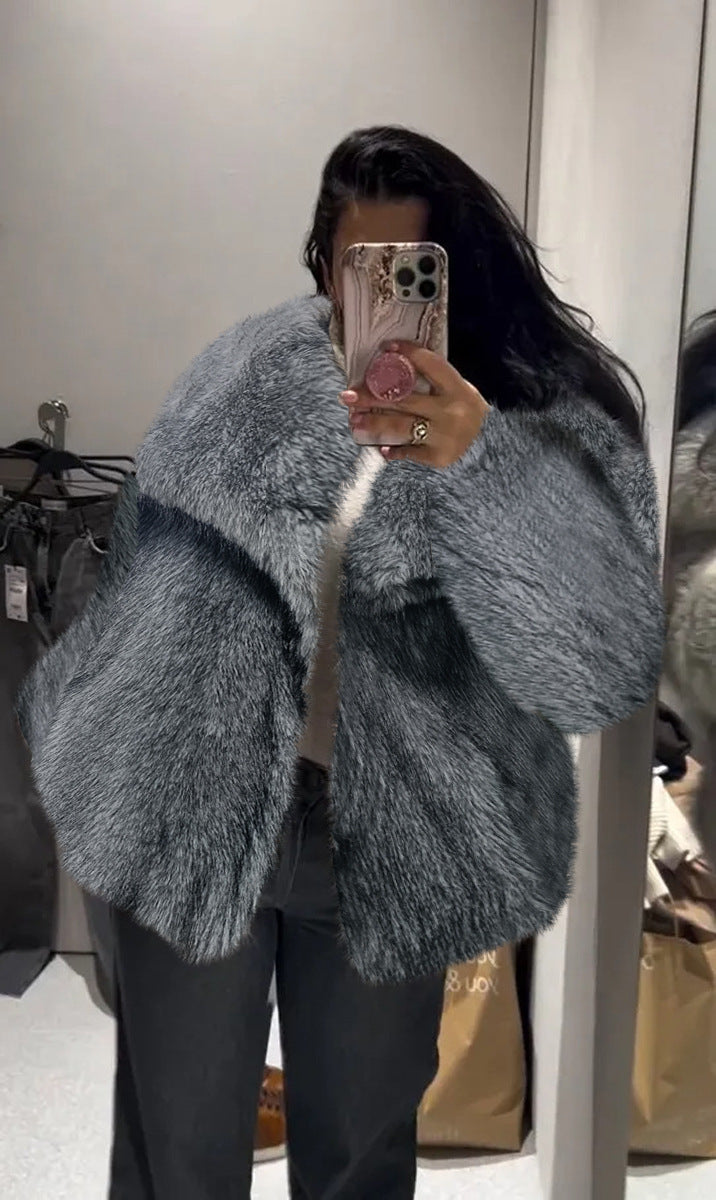 Fluffy faux fur jacket with a lapel collar and long sleeves