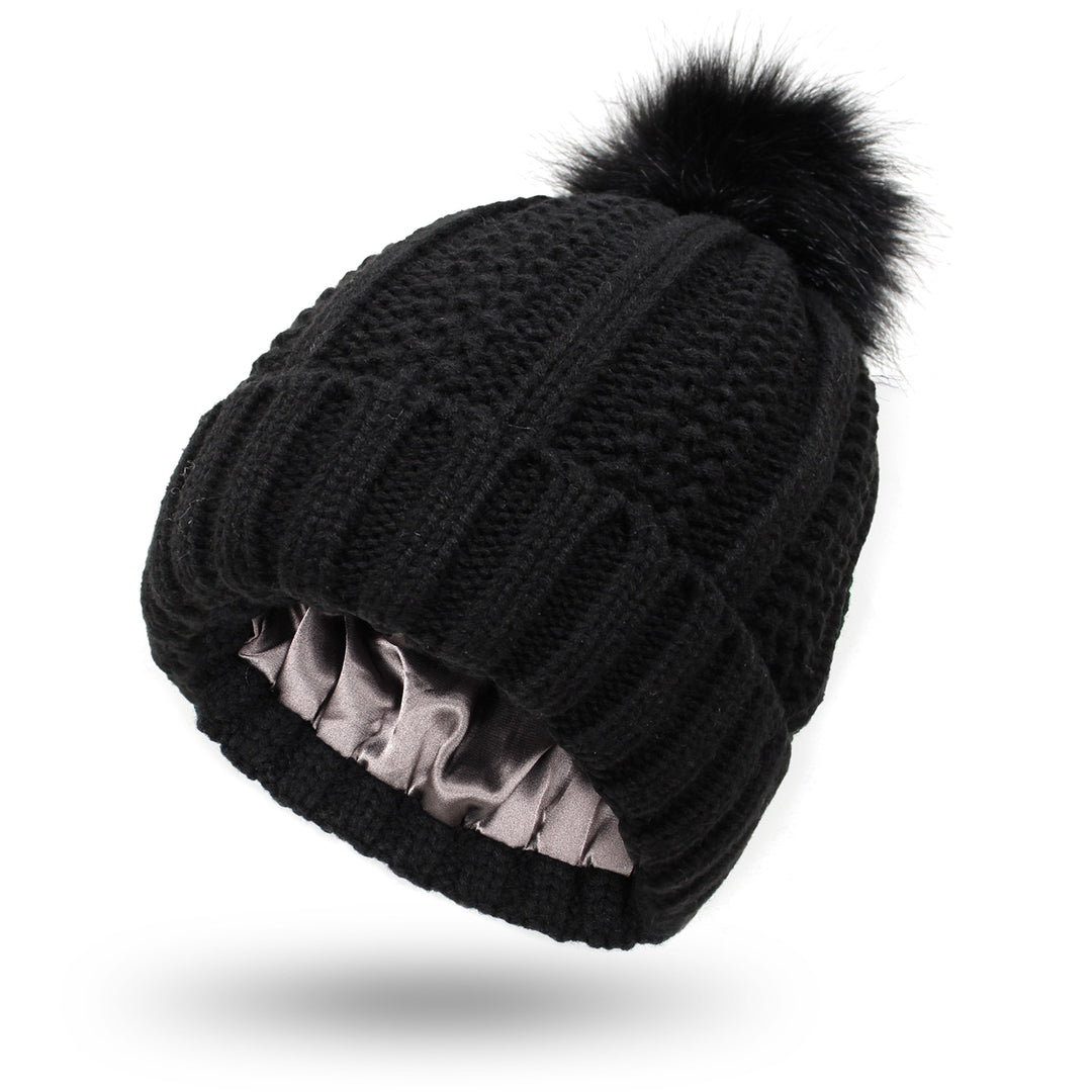 Knit beanie with faux fur pom pom