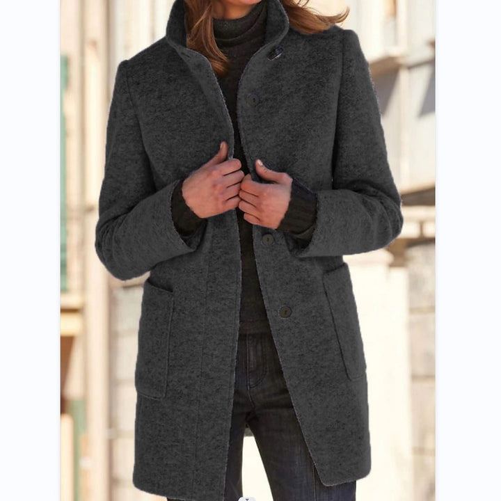 Woman in stand collar button coat
