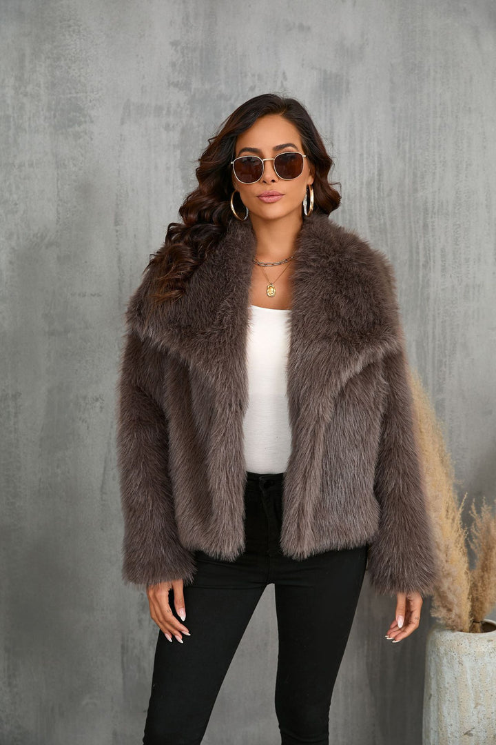 Fluffy faux fur jacket with a lapel collar and long sleeves