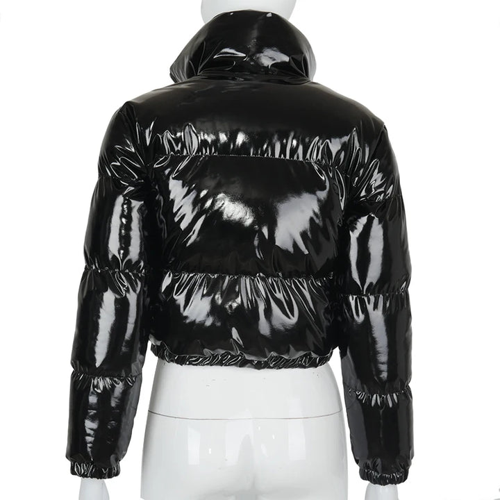 Woman in a glossy cropped puffer jacket