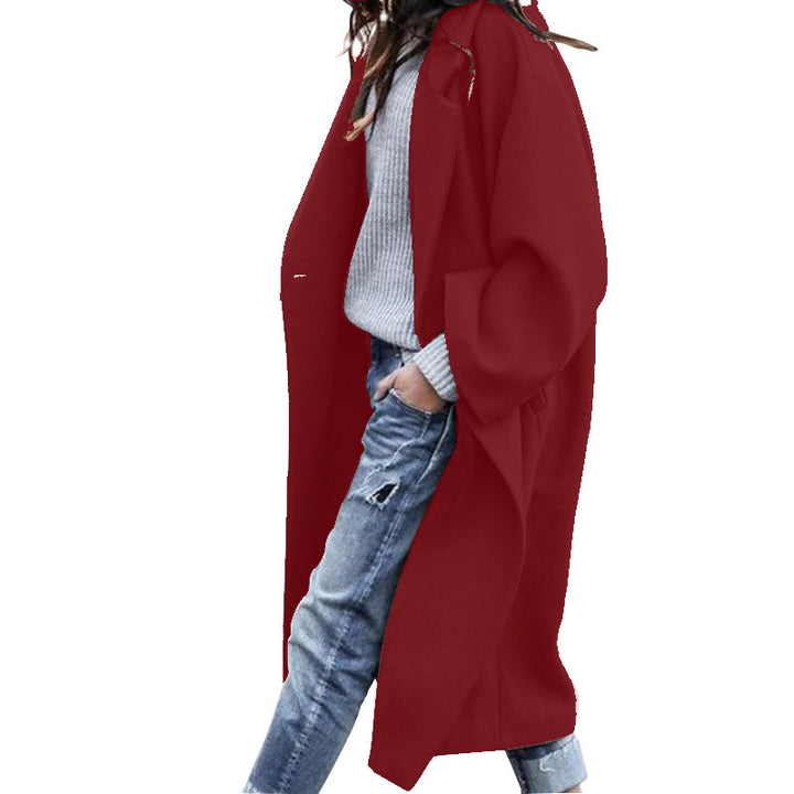 Single-breasted long coat with a lapel collar and pockets