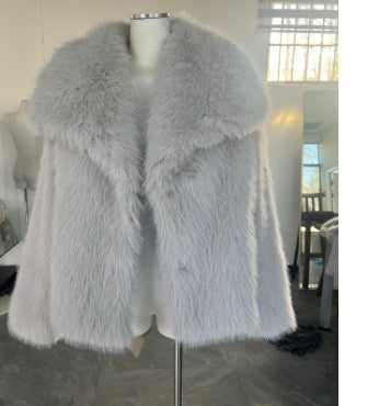 Fluffy faux fur jacket with a lapel collar and long sleeves